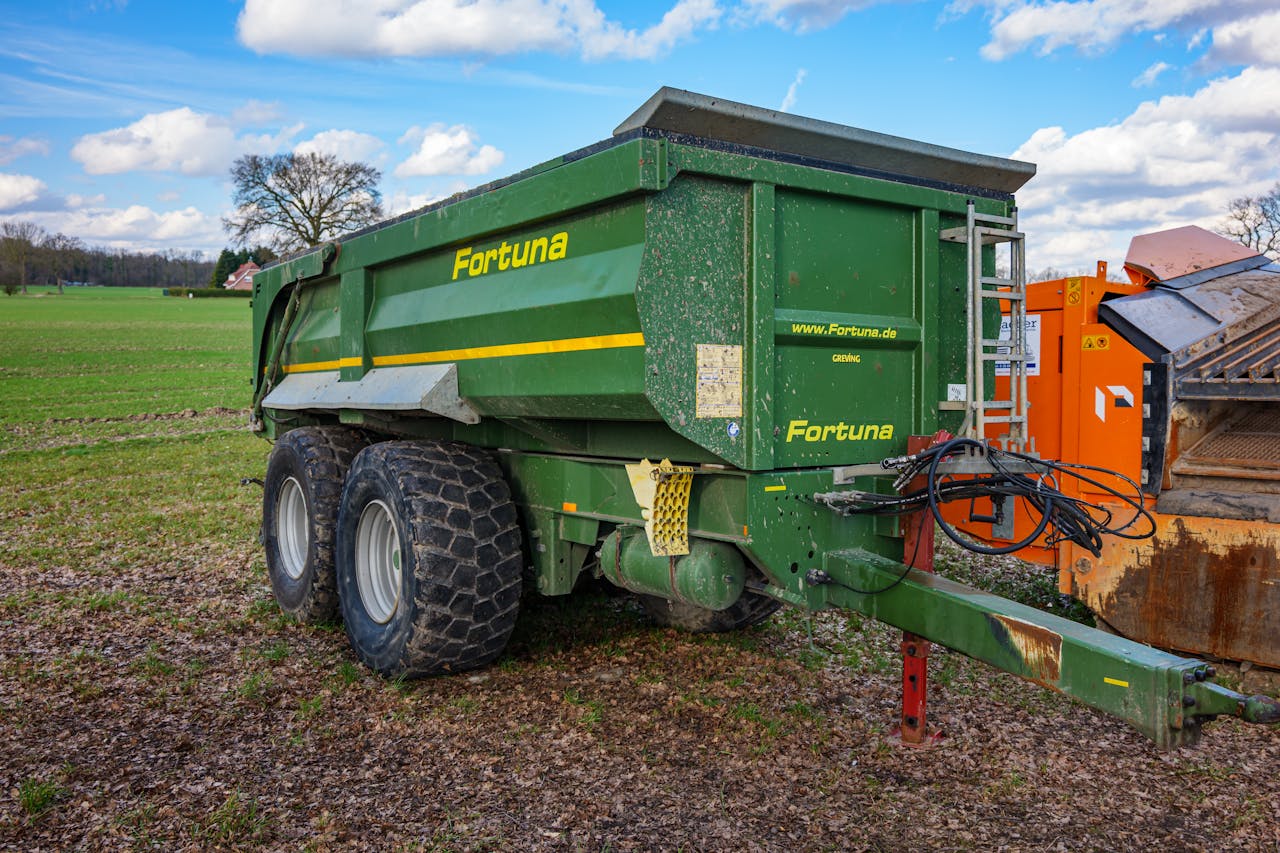 Green Fortuna trailer parked in a field, Coesfeld, Germany.